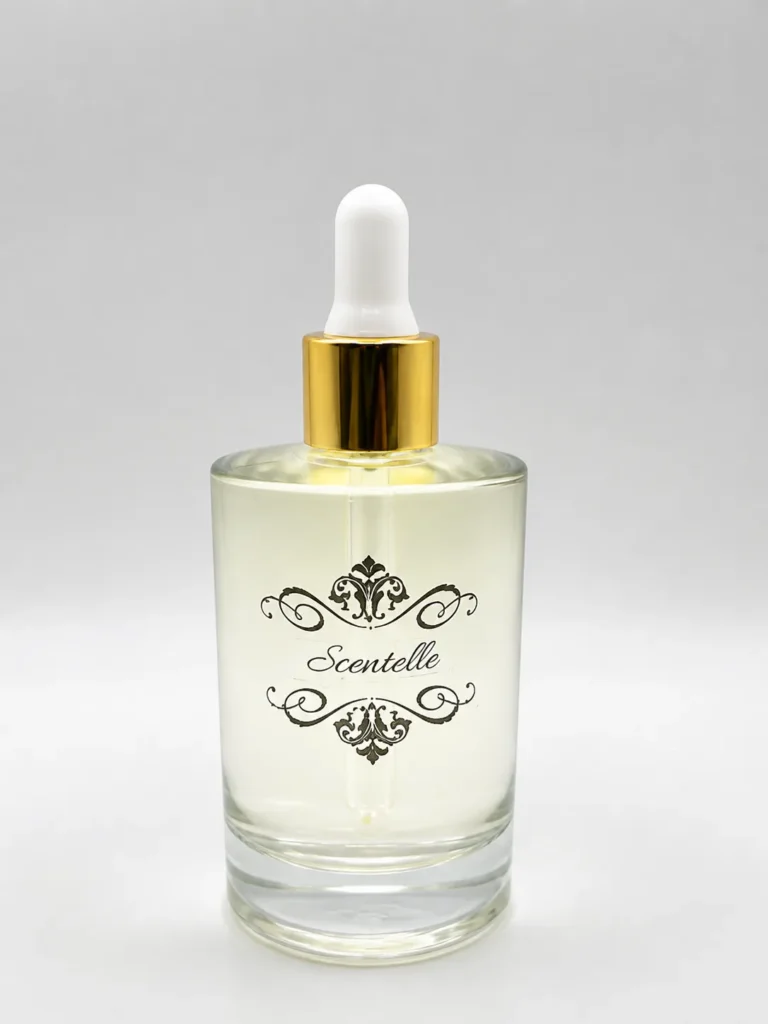 Scentelle 3.4 oz serum dropper body oil in a large glass bottle with clear liquid and a gold and white rubber dropper.